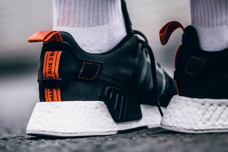 Adidas nmd r2 on sale black and orange